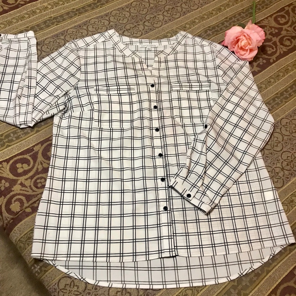 Black and white plaid blouse.
